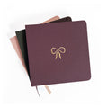 Vintage Bow Foil Embossed Square Linen Notebook by Studio Portmanteau